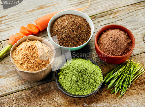 Image of bowls of various dried plant powders