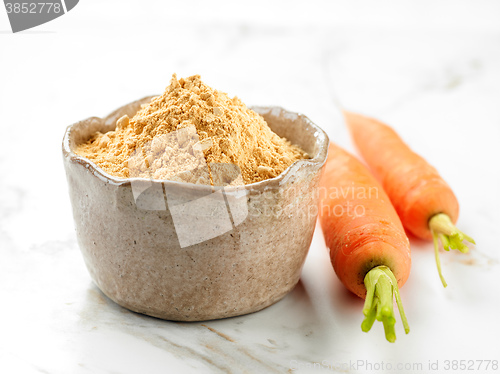 Image of bowl of dried carrot powder