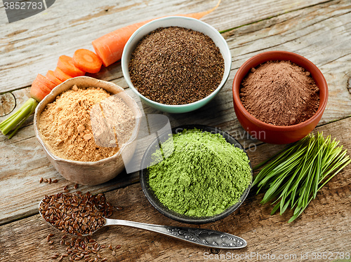 Image of bowls of various dried plant powders