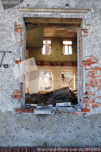 Image of old window from damaged house 