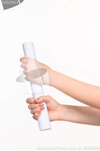 Image of The cylinder female hands on white background