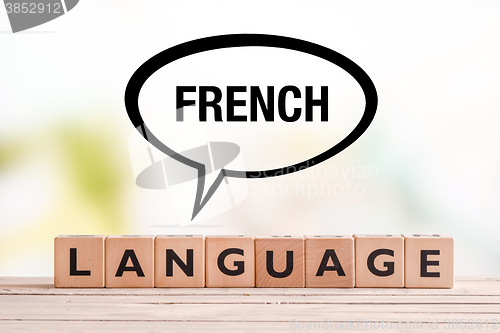 Image of French language lesson sign on a table
