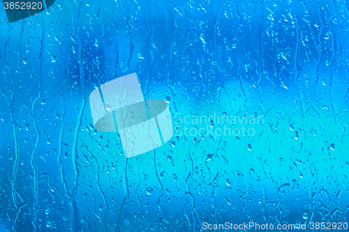 Image of Fresh water on a blue window