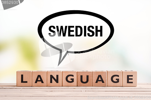 Image of Swedish language lesson sign on a table