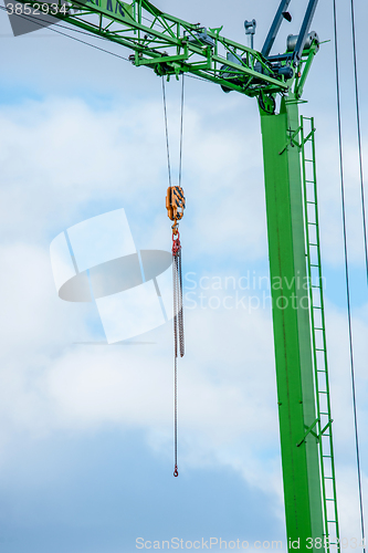 Image of Green crane with a chain