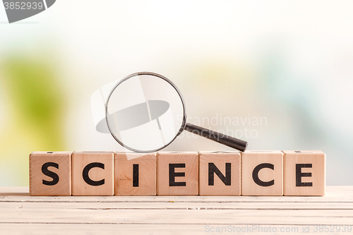 Image of Science sign with a magnifying glass