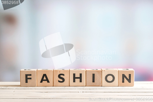 Image of Fashion sign made of wooden blocks