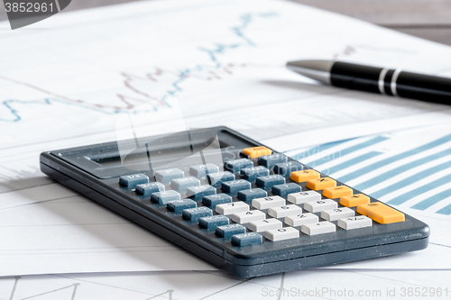 Image of Calculator on some paper diagrams