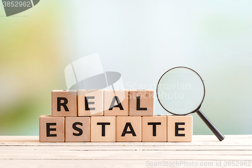 Image of Real estate search sign on a table