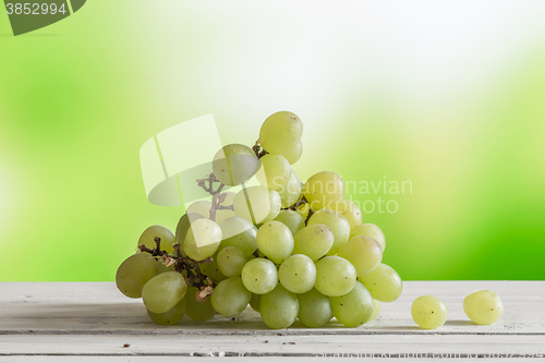 Image of Grape ripe on a wooden table