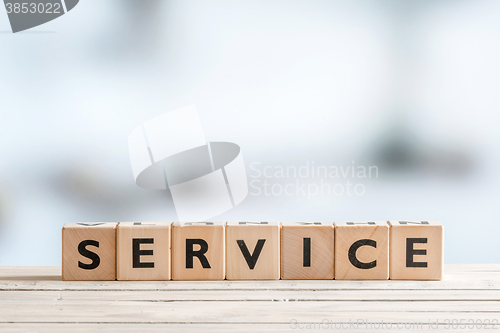 Image of Service sign on a wood table