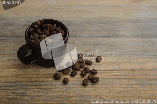 Image of cup and coffee beans