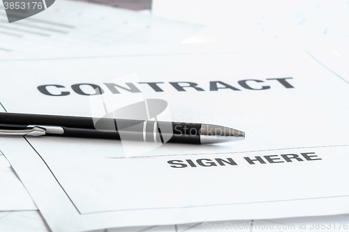 Image of Black pen on a contract