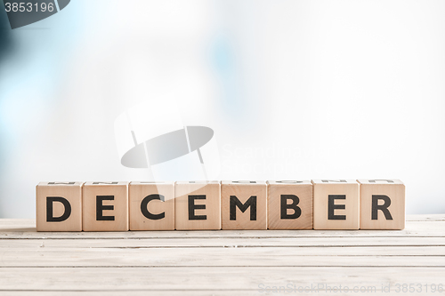 Image of December label made of wooden cubes