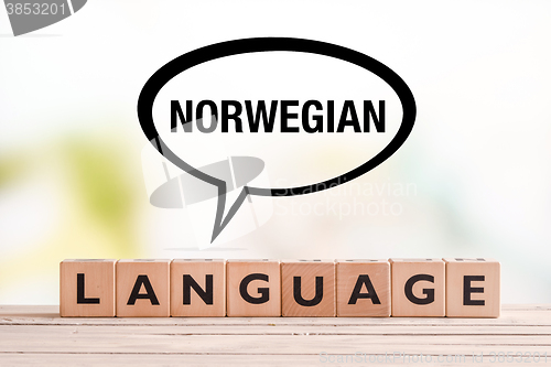 Image of Norwegian language lesson sign on a table