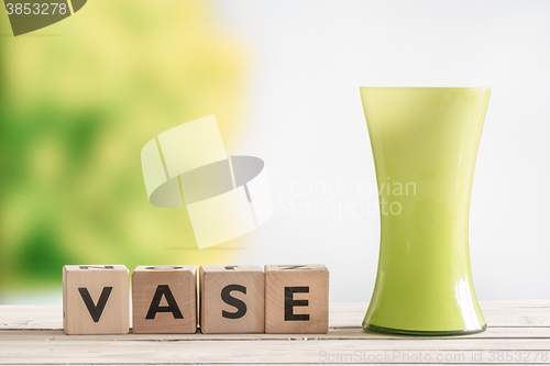 Image of Wooden sign with the word vase