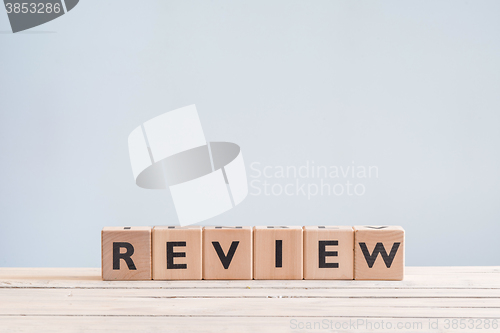 Image of Review sign on a table