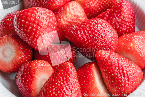 Image of Raw strawberries in a porcelain dish