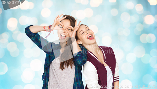 Image of happy smiling pretty teenage girls having fun