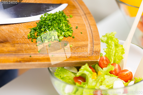 Image of close up of chopped onion and vegetable salad