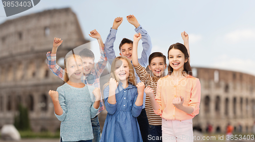 Image of happy children celebrating victory over coliseum