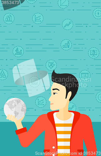 Image of Man holding globe.