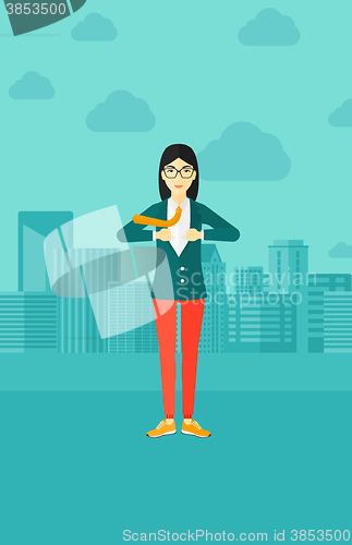Image of Business woman taking off jacket.