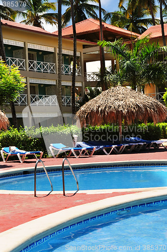 Image of Swimming pool hotel at tropical resort