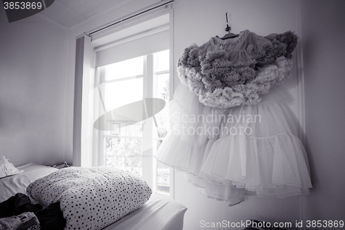 Image of Dress haning in a bedroom