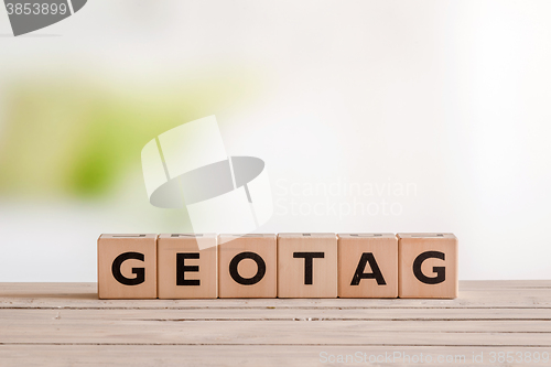 Image of Geotag sign on a table