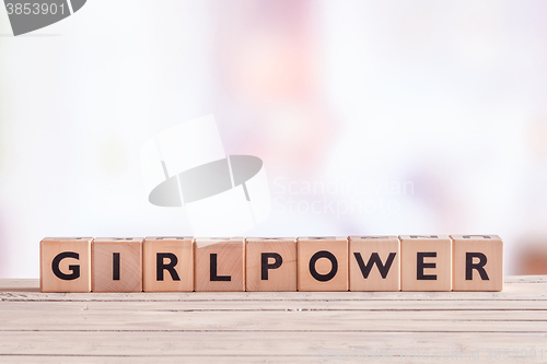 Image of Girlpower sign on a table