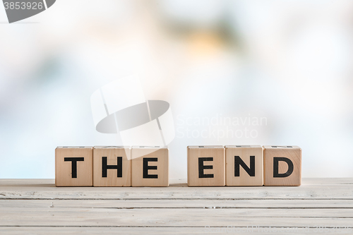 Image of The end sign with wooden blocks