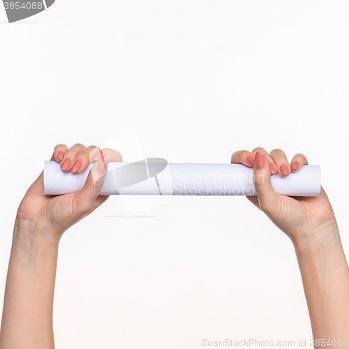 Image of The cylinder female hands on white background