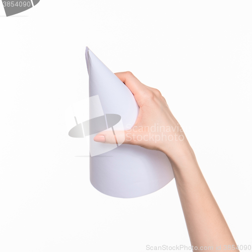 Image of The cone in female hands on white background