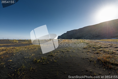 Image of Deserted shore with black sand