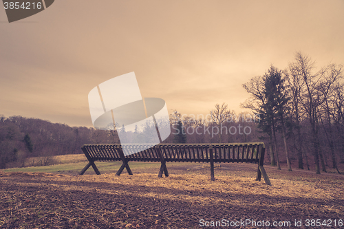 Image of Empty feeding stand on a field