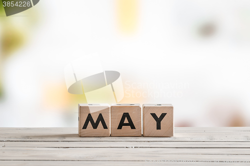 Image of May word on wooden sign