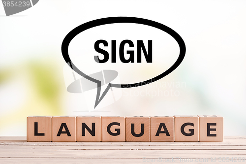 Image of Braille language lesson sign on a table