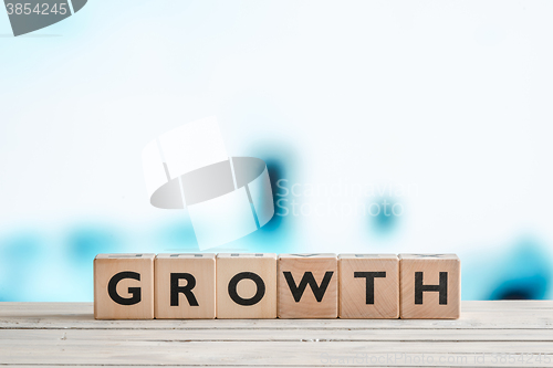 Image of Growth sign made of wooden cubes