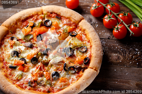 Image of Pizza with tomato, mushroom and olives