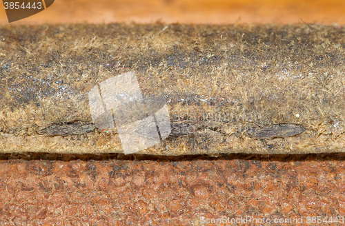 Image of Close-up of old stiches in leather