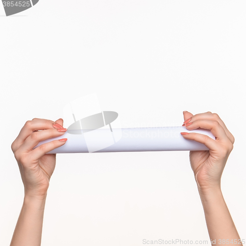 Image of The cylinder female hands on white background