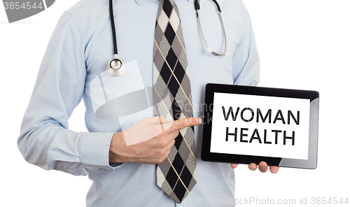 Image of Doctor holding tablet - Woman health