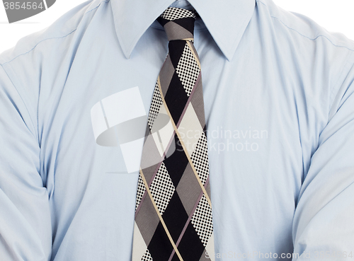 Image of Man wearing wrinkled blue shirt with necktie, isolated