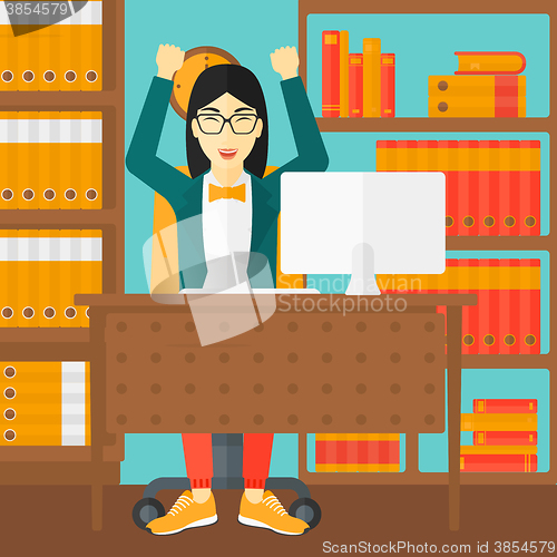 Image of Woman working at office.