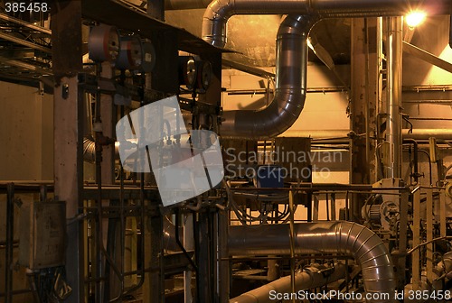 Image of Equipment, cables and piping as found inside of a modern industr