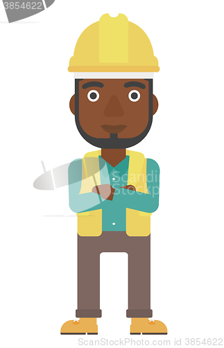 Image of Friendly builder with arms crossed.