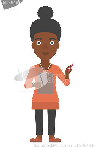 Image of Woman standing with pen and file in hands.