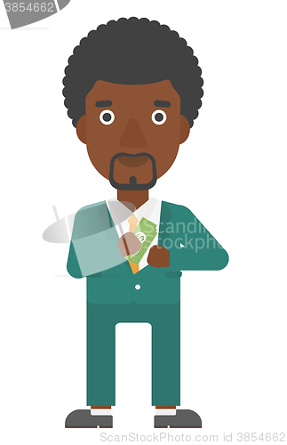 Image of Man putting money in pocket.