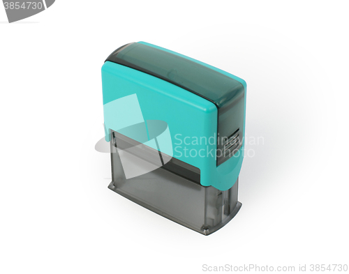 Image of Plastic stamp in hand, isolated